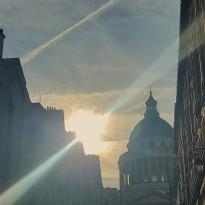 The sun illuminating the Pantheon from behind.