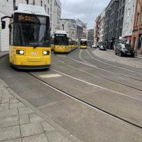 Multiple trams stopped on a Berlin street