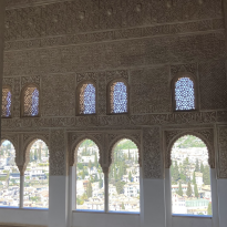 Window arches with Granada visible beyond