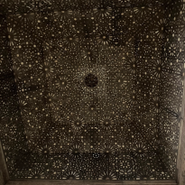 wood inlay ceiling with dark and light wood to look like stars