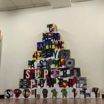 a picture showing a pyramid built from different letters that make the word community