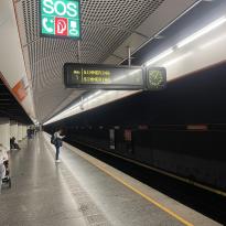 Station platform with digital sign