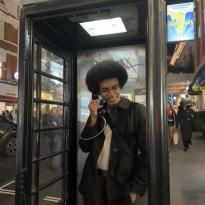 Man in telephone booth