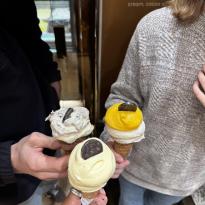 Three people holding gelato