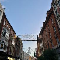 Holiday lights over a street