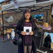 Woman holding records