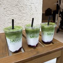 Three blueberry matcha lattes from Mooi Matcha 