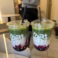 Two blueberry matcha lattes from Nori Cafe