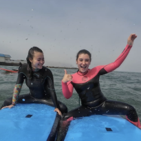 Ella and I surfing