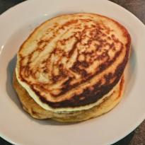A stack of about 4 pancakes with a beautiful brown marbling.