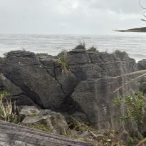 A photo of pancake rocks which are layered rocks made of limestone.