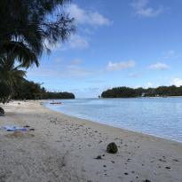 A shallow, white-sand beach.