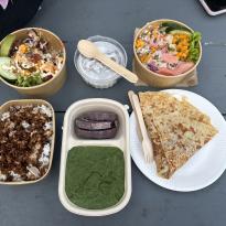 An array of six different foods on a table.