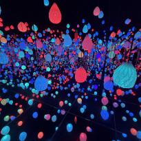 Room with colorful hanging glowing lights