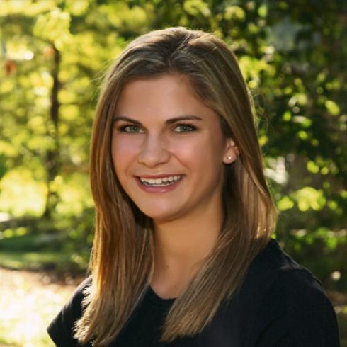 1. Aerial view of a sprawling city under a cloudy sky.
2. Sunset over Barcelona with vivid pink and purple hues.
3. Twilight cityscape with glowing city lights.
4. Portrait of a smiling woman with long hair in a green park. This alt text was added with Al; accuracy may vary.
