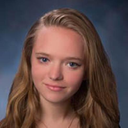 Group standing on a sandy beach with ocean in the background. 

Melted clock draped over table edge, inspired by Dali. 

Portrait of a person with long hair, neutral expression. This alt text was added with Al; accuracy may vary.
