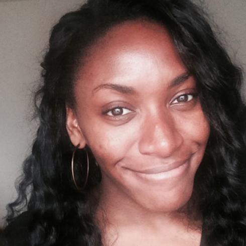 Zebra-print suitcase with travel essentials arranged neatly beside it. This alt text was added with Al; accuracy may vary.