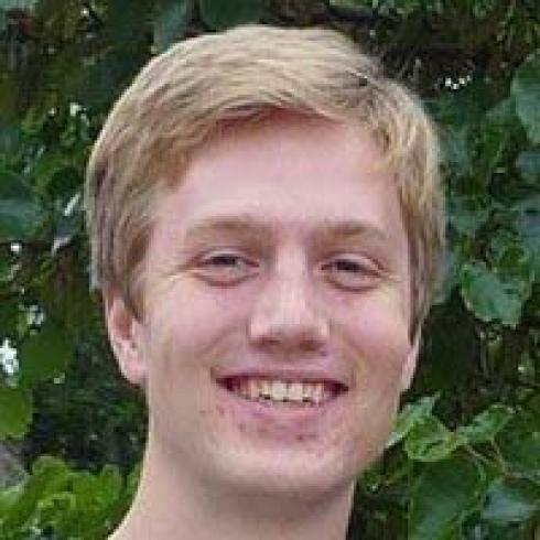 1. Circular window with statue in the distance.
2. Roman ruins with ancient columns and buildings.
3. Spiral stone staircase viewed from above.
4. Person smiling with long hair, wearing denim jacket.
5. Person smiling with short hair, greenery background. This alt text was added with Al; accuracy may vary.