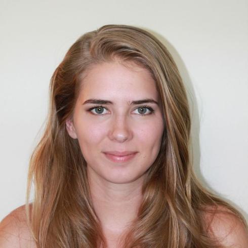 Portraits of five people, each smiling or serious, with varying backgrounds. This alt text was added with Al; accuracy may vary.