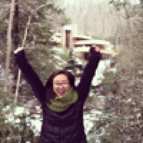 Elegant dining room with ornate decor, blue walls, and a set dining table. This alt text was added with Al; accuracy may vary.