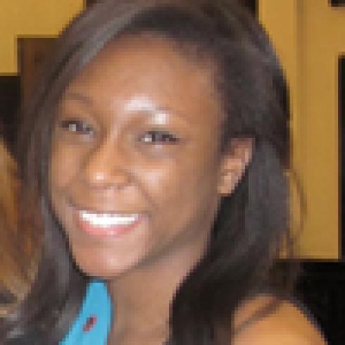 1. Woman in beanie and leather jacket, smiling outdoors.
2. Woman with long dark hair, smiling warmly.
3. Woman leaning on hand, smiling in front of board.
4. Blonde woman in pink, smiling near a building.
5. Woman with long dark hair, smiling brightly. This alt text was added with Al; accuracy may vary.