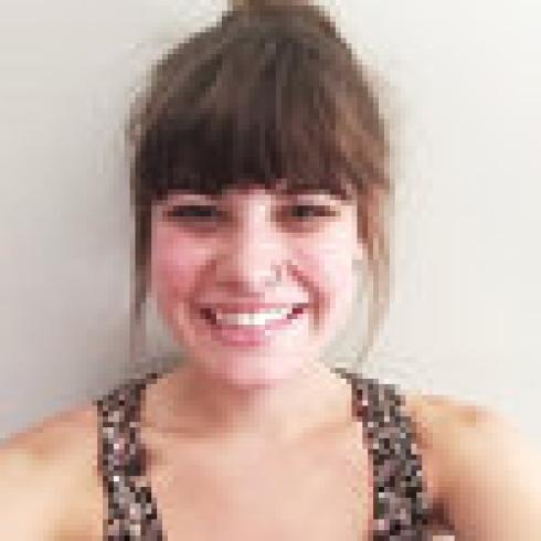 Four smiling people with varied hair colors and styles. This alt text was added with Al; accuracy may vary.