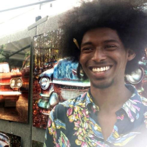 Ancient stone building tower with arched windows against blue sky. This alt text was added with Al; accuracy may vary.