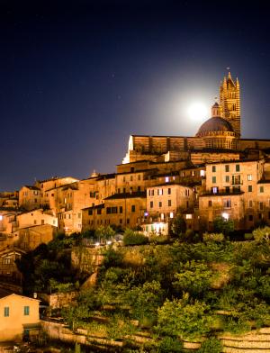 Siena under the stars at night