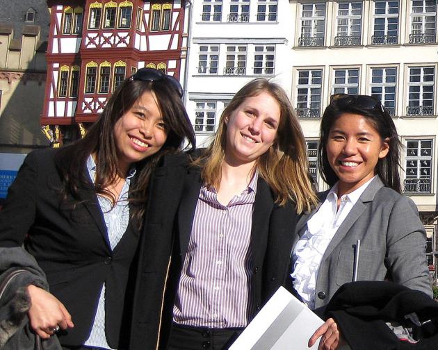 three student interns dressed professionally in Germany