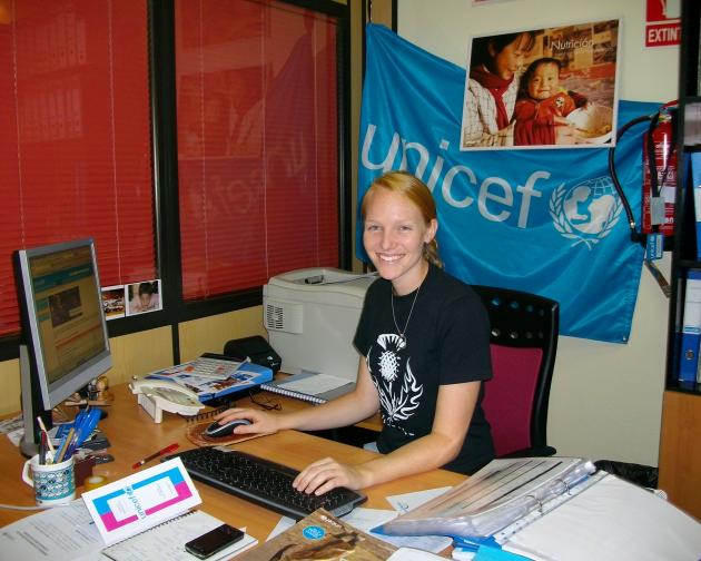 a student sitting at a computer at UNICEF