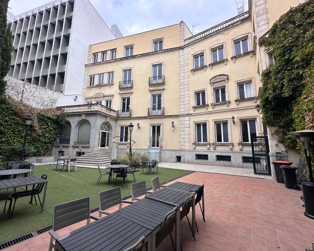 An outdoor patio with tables