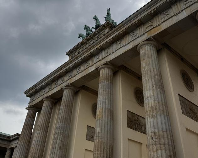 A gate with horse on top