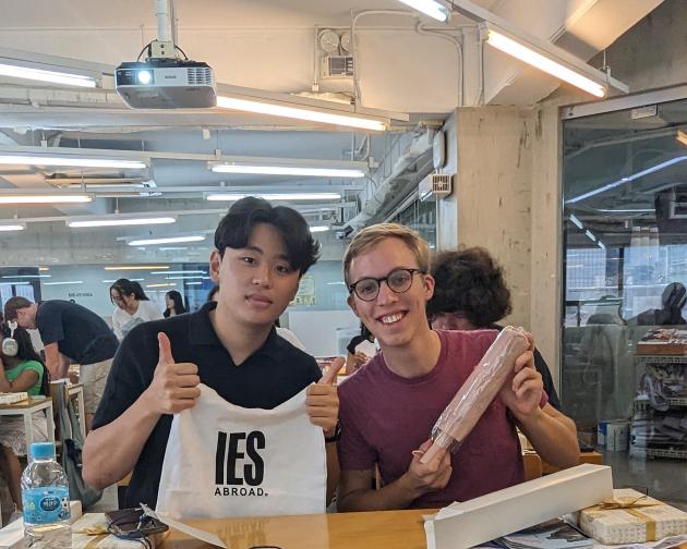 A photo of students smiling at Seoul orientation