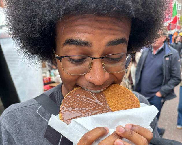 Me eating a Stroopwaffle