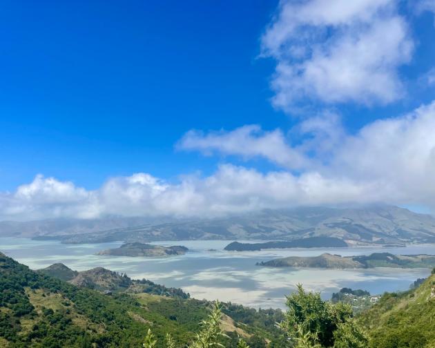 The view of the sky and hills while hiking at Sign of the Kiwi in Christchurch, NZ