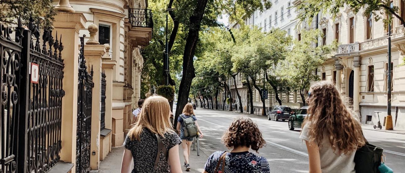 three students walking in paris