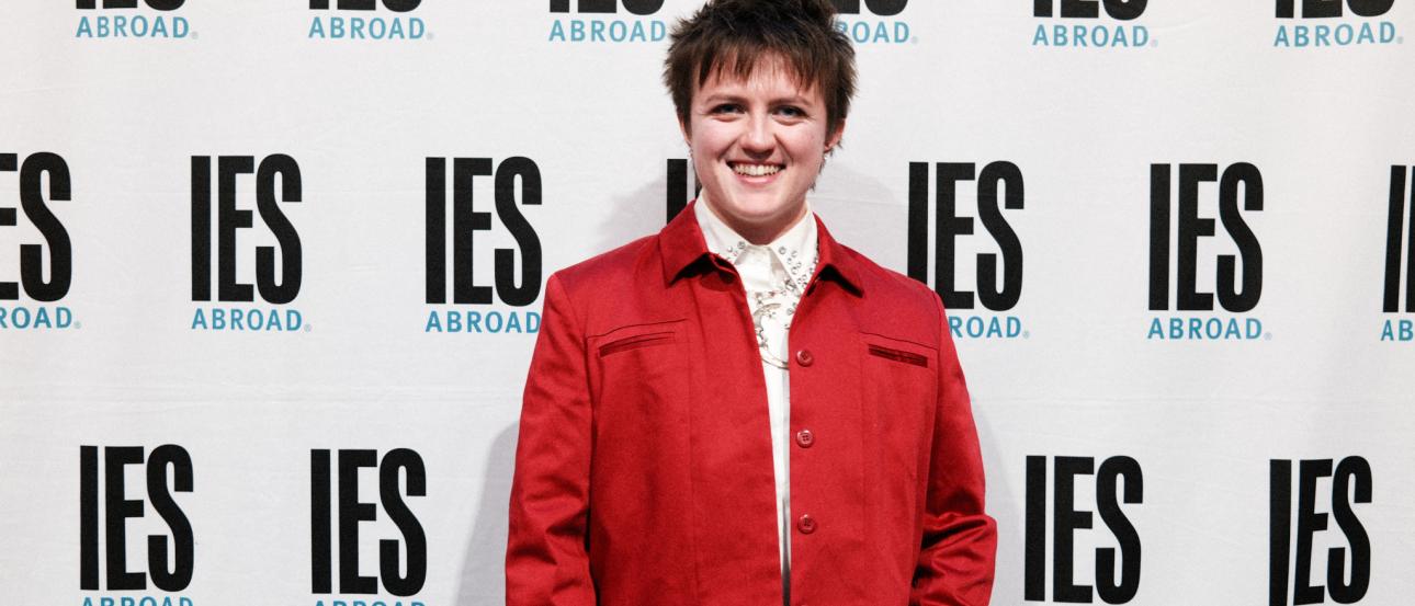 A person in front of a background that says IES Abroad