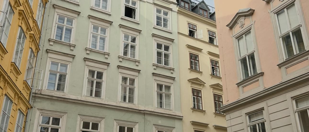 A row of pastel colored buildings in downtown Vienna.