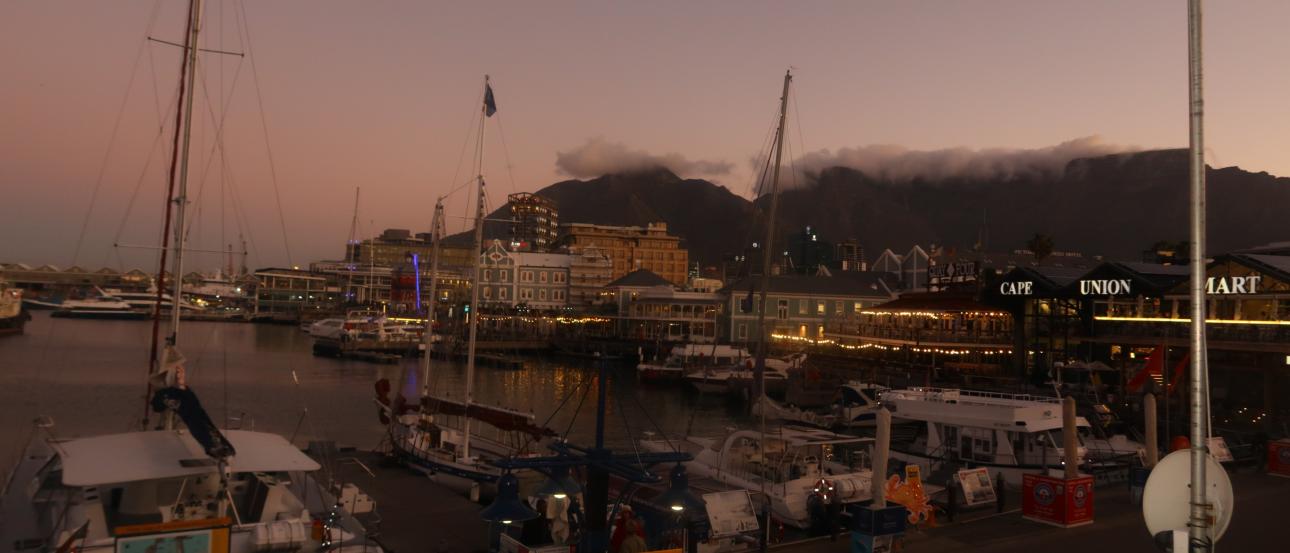Cape Town sunset image on the docs by the V and A Waterfront. 