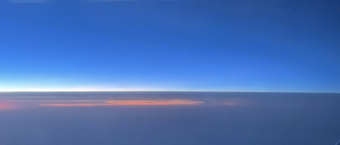 Dark sky out of an airplane window