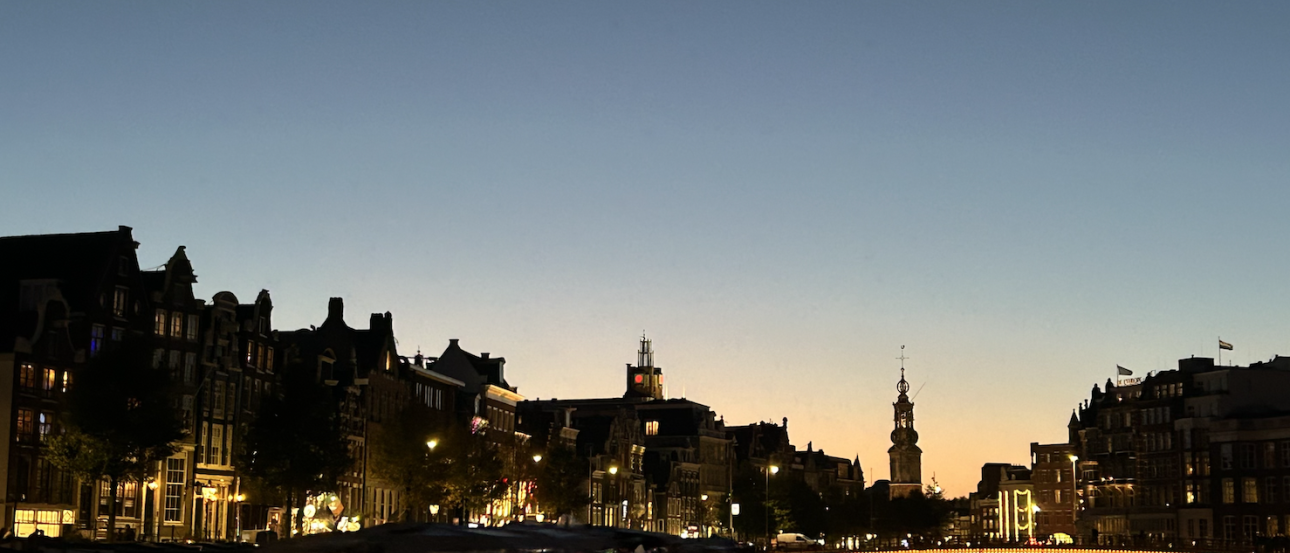 A sunset over a canal in Amsterdam