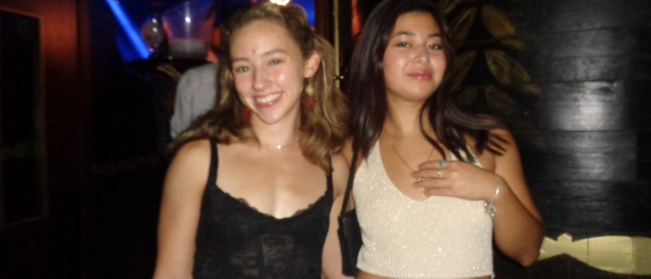 Me and my friend Keala smiling at the entrance to Mae West, the biggest club in Granada. 