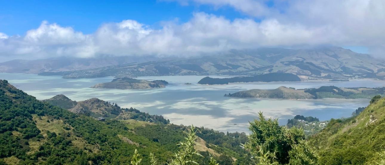 The view of the sky and hills while hiking at Sign of the Kiwi in Christchurch, NZ