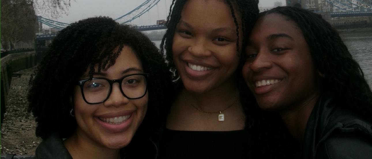 3 Black female students studying abroad together 