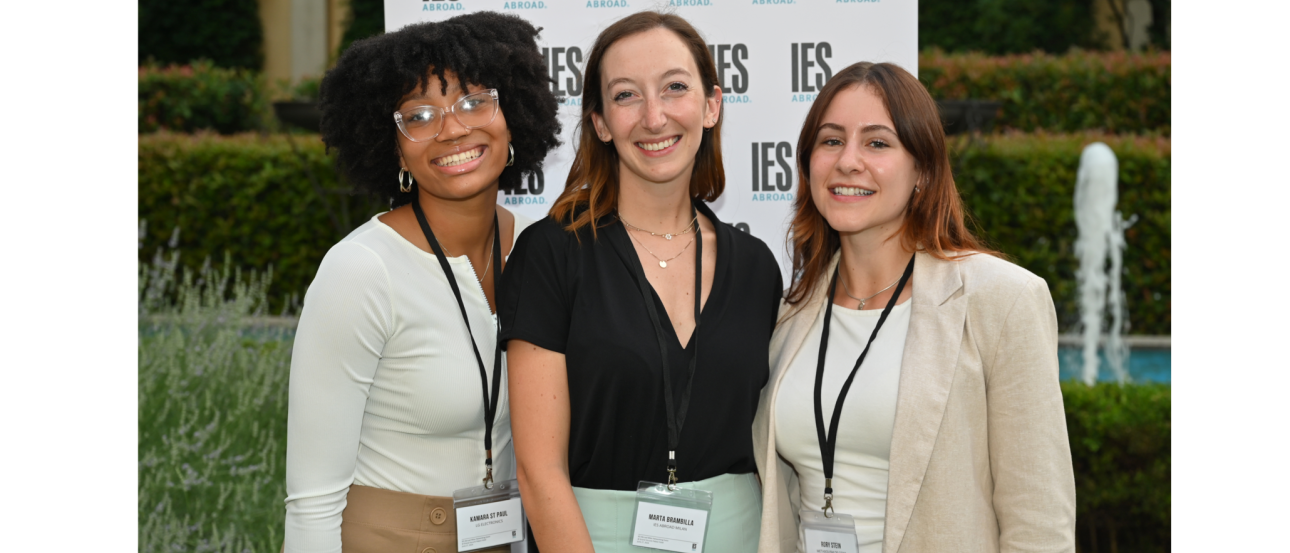 Group of 3 students smiling during their internship event in Milan