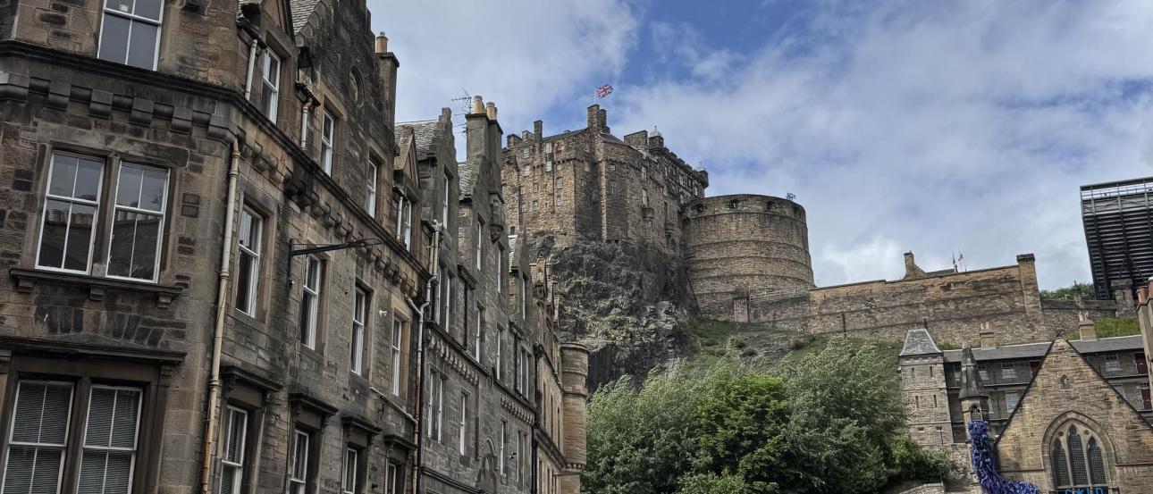 The view of Edinburgh Castle from a street below
