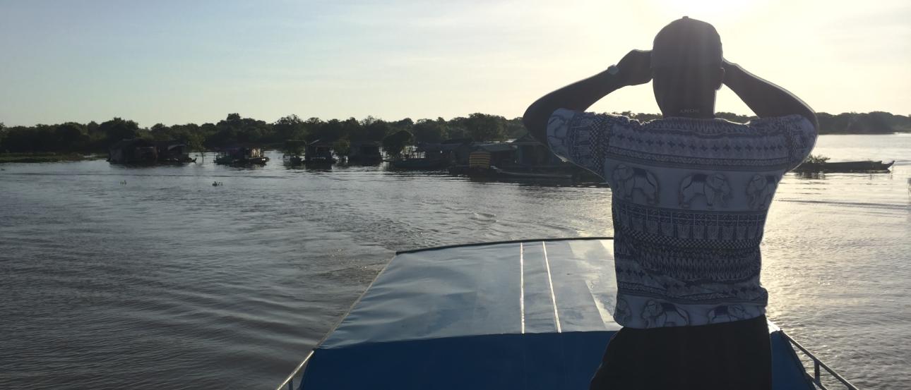 Poached eggs with cherry tomatoes on a plate.

Plate of rigatoni pasta with grated cheese.

Historic building with two towers and hedges.

Person on a boat gazing at the water during sunset. This alt text was added with Al; accuracy may vary.