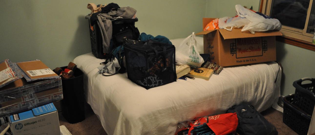 Skyline with spire, hills in the distance on a clear day. This alt text was added with Al; accuracy may vary.