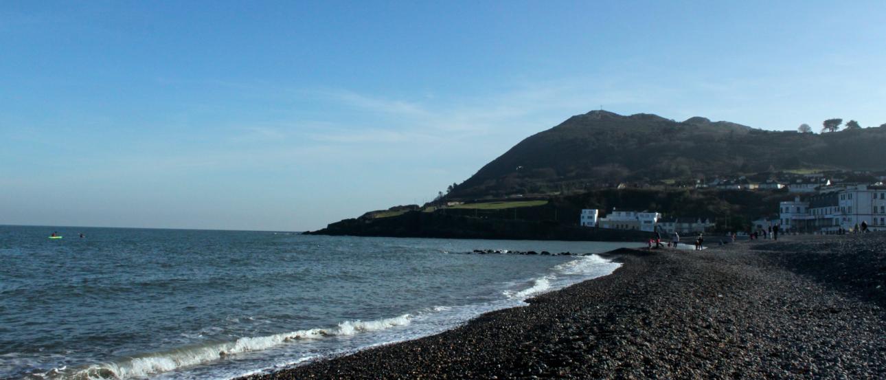A gray, overcast Paris skyline featuring the Eiffel Tower in the distance. This alt text was added with Al; accuracy may vary.