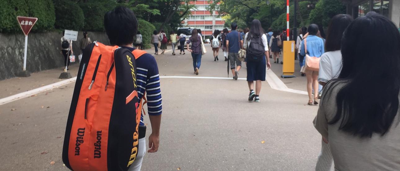 A large, crispy crepe with melted cheese and ham on a white plate. This alt text was added with Al; accuracy may vary.